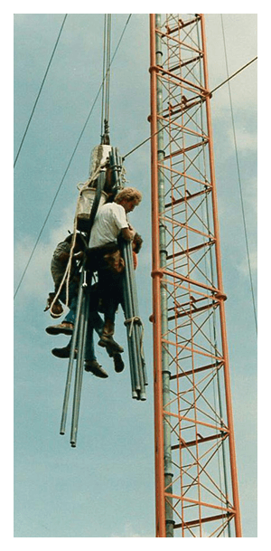 Image of hauling equipment up the tower.